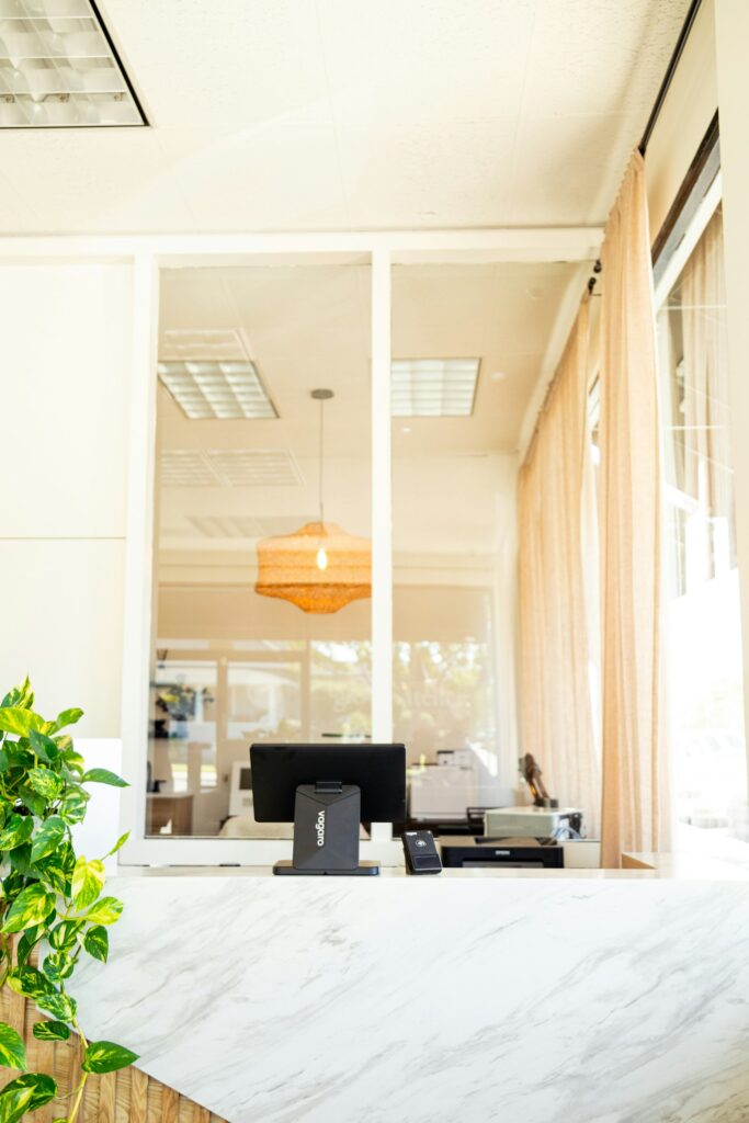 Technology-equipped reception desk for automated visitor services