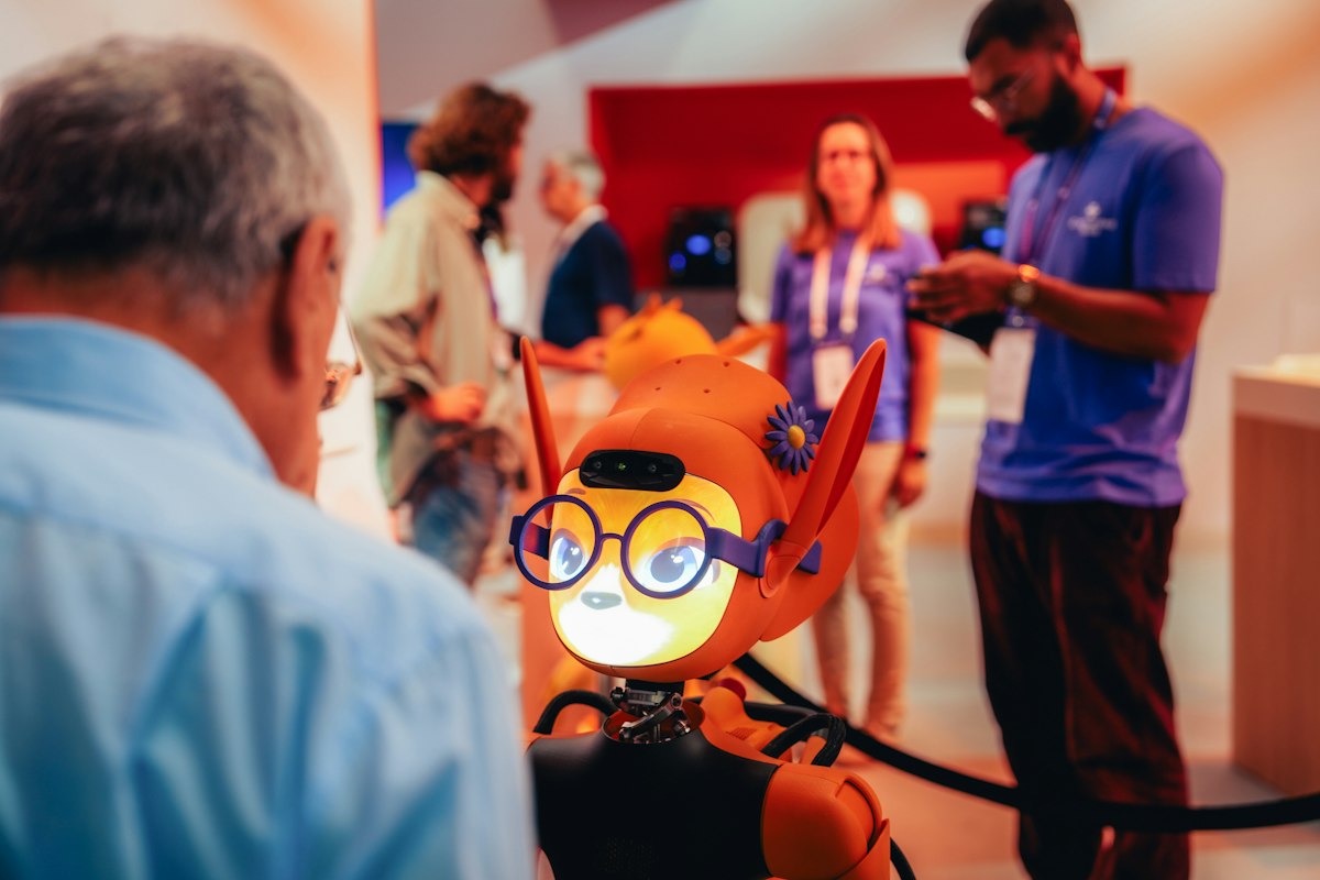 A small robot engaging people in a public exhibition hall